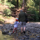 Walking in the creek with Grandad