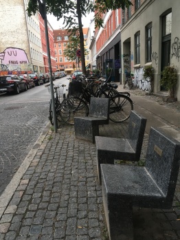 Artistic benches and chairs throughout the city